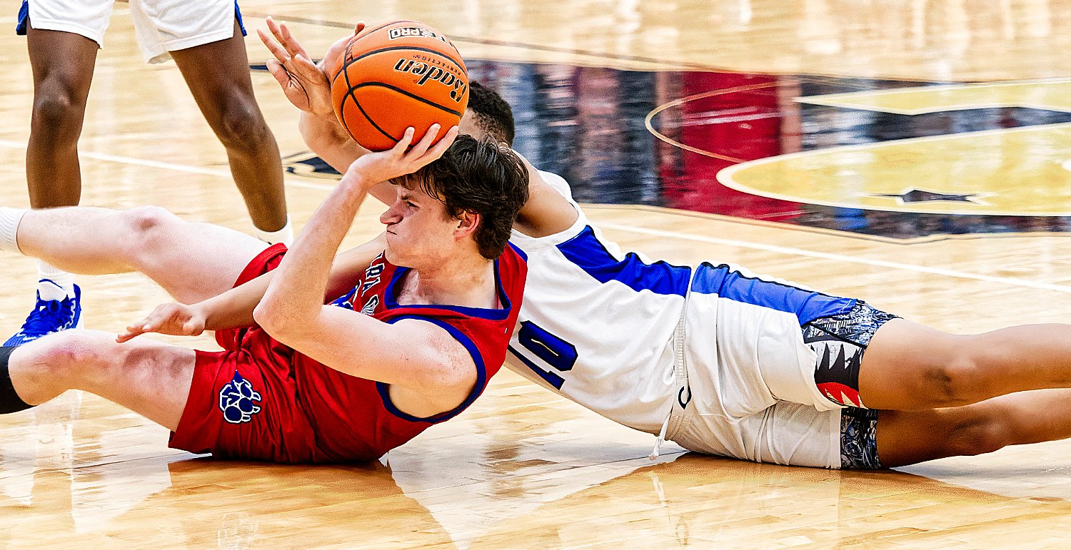 Kaden Kennedy comes up with the loose ball. [see more shots, buy basketball photos]